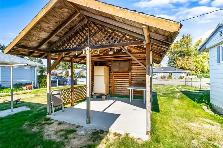 Covered Concrete pad, this space could be used for so many things.