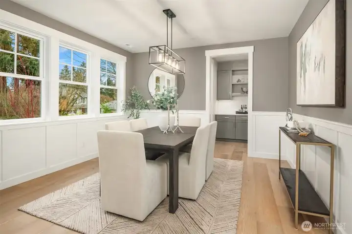 Formal Dining Room offers designer paint& wainscot detail