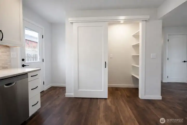 Pantry and designated area for stackable washer and dryer