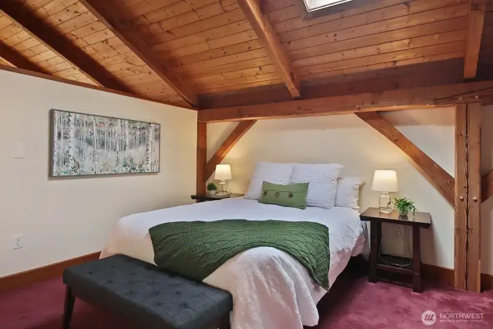 The Primary bedroom suite features a walk-in closet with built in drawers and a window.