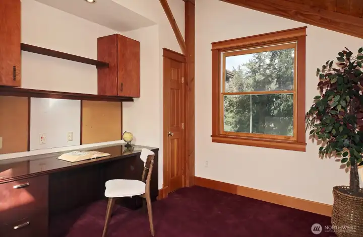 One of the upper level flex spaces makes a quiet office space.