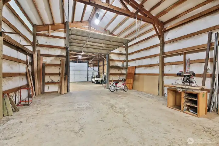 The shop connected to the Garage is approximately 46'7" x 23'7". It has been a wonderful wood shop with good lighting, insulation, and plenty of electrical outlets.