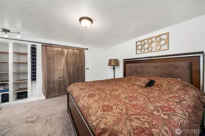 Closet with built-in shelving to keep organized.