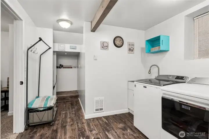 Your laundry room even includes a dedicated corner for your fur baby to have some privacy.