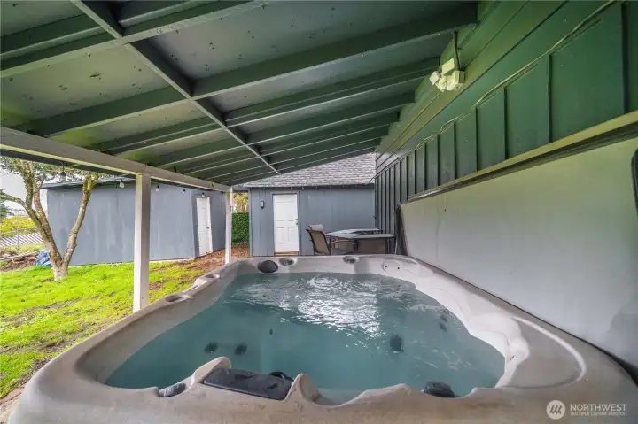 Private hot tub with covered patio