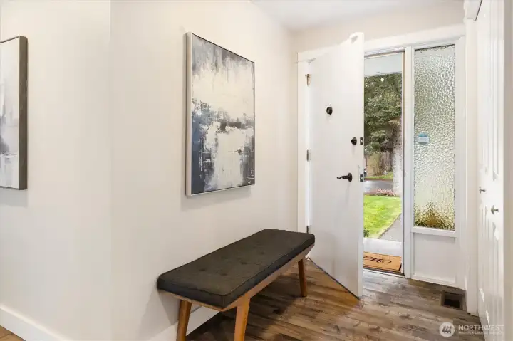 A welcoming entrance with a convenient coat closet.