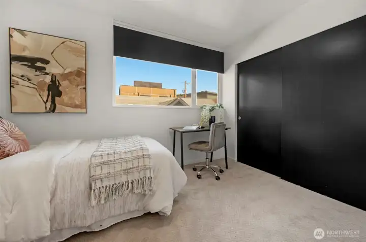 Each bedroom features expansive, double-pane windows that allow for the same abundant natural light found throughout the main living areas. These bright spaces are complemented by a high-efficiency ductless mini-split system to ensure year-round comfort in every room.