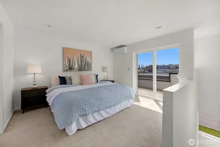 Top-Floor Primary Suite: A private oasis boasting an oversized walk-in closet, double-sink ensuite with a modern walk-in shower, and a private deck with serene mountain views.