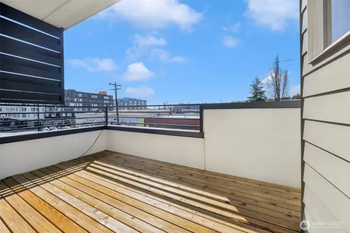 Private view deck + manicured entry.