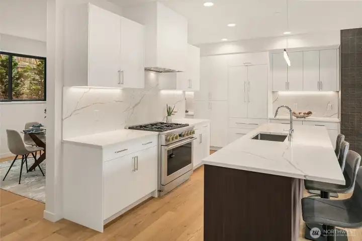 Sleek kitchen with modern finishes and generous prep space