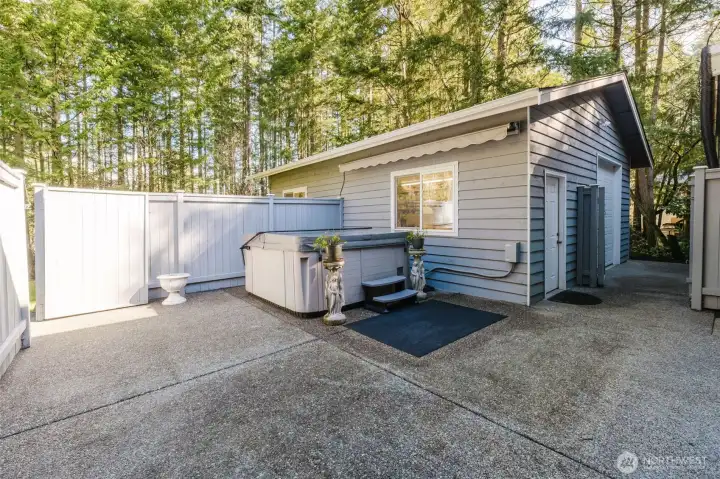 Hot tub, with patio area.