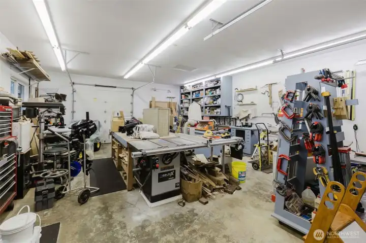 24 x 30  Shop  10ft ceiling - 8ft door (in back of picture) 9ft door on the front end of the shop.