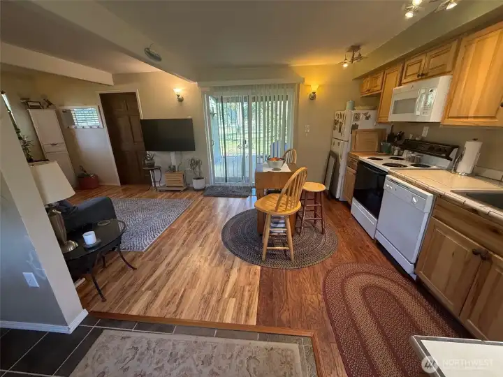 Your sliding glass door off the living area leads to a terrific back yard. Your sliding glass door off the living area leads to a terrific back yard.