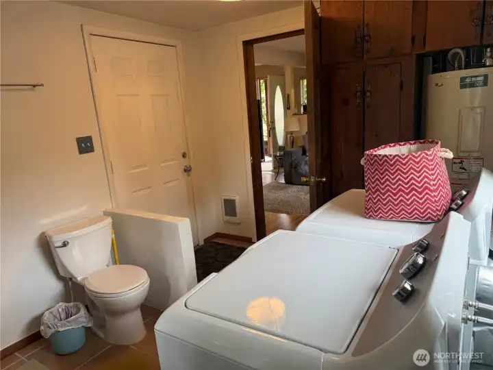 Downstairs bathroom/laundry room. Downstairs bathroom/laundry room.