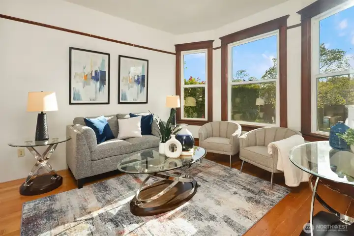 Spacious living room with ample natural light.