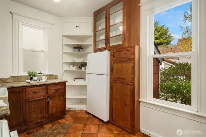 Kitchen with built in cabinet storage.