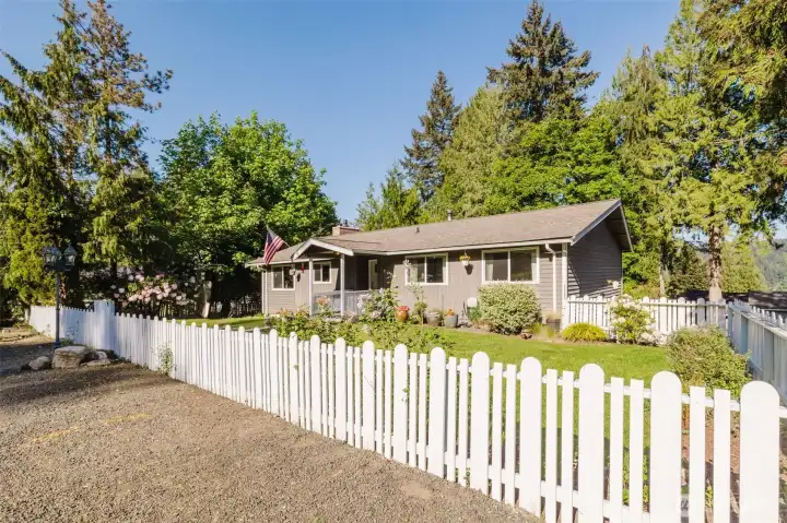 Front Yard fenced with the Cutest White Picket Fence