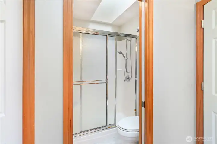 Primary bath with walk-in shower and separate large soaking tub