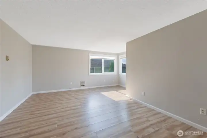 Main floor unit sun-kissed living room