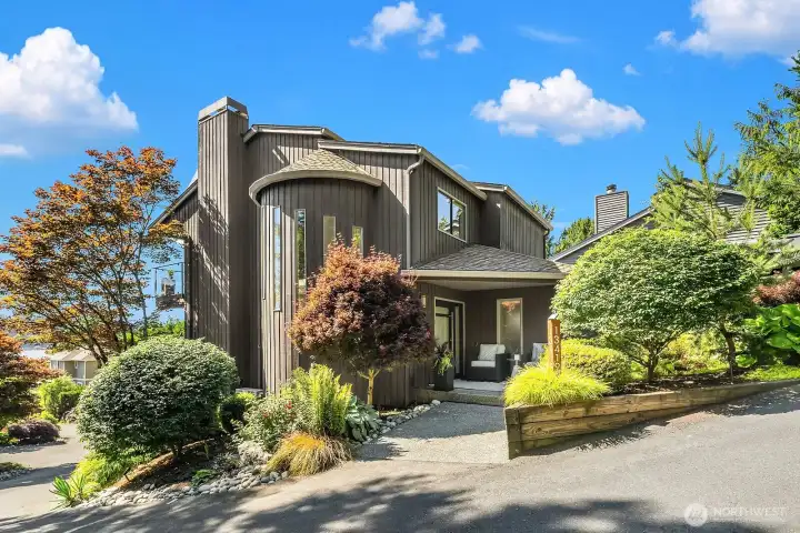 Experience the best of Lake Washington living from this updated Holmes Point residence offering captivating lake views, stunning sunsets, and deeded shared waterfront ownership with dock and moorage. Two car garage parking, plus an amazing additional 7 spots for your guests.
