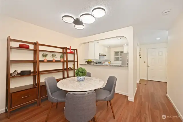 Entertainers delight with breakfast bar opens to kitchen.