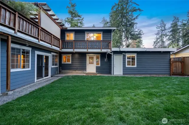 Backyard, entrance to lower unit