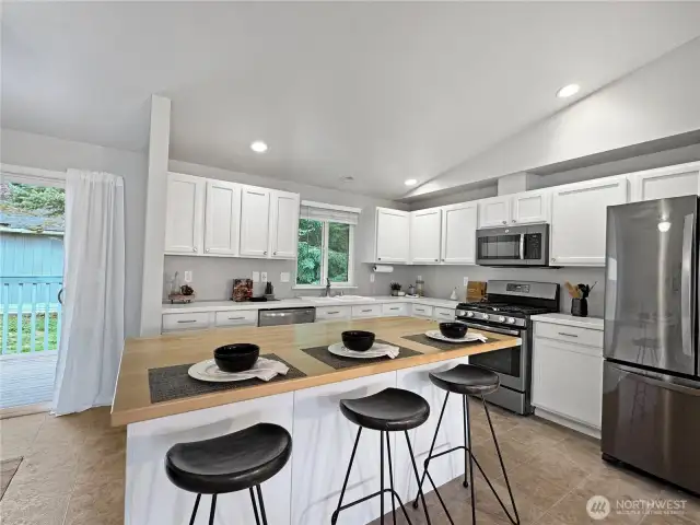 Bar seating on the large kitchen island.