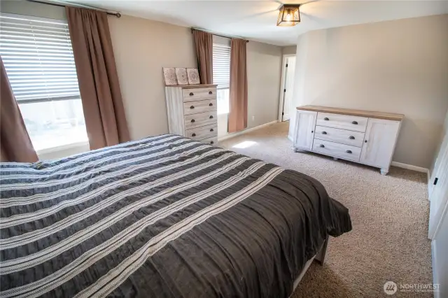 The primary suite is spacious & relaxing.
