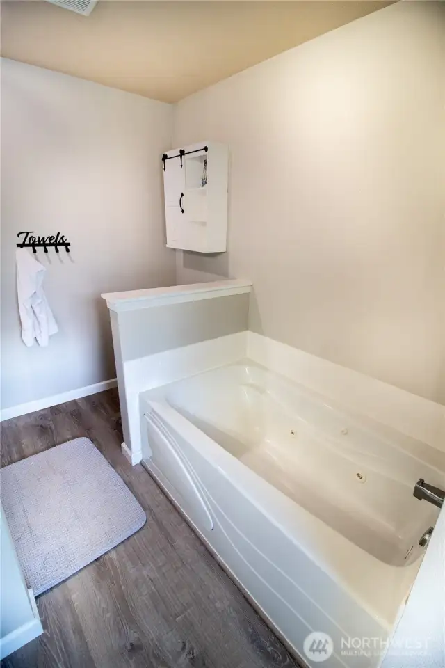 Relax after a long day in the jetted soaking tub!