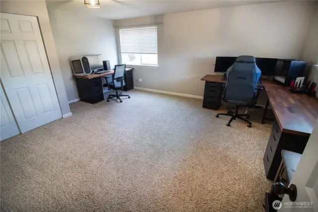 Upstairs bedroom #2 is HUGE! Currently used as a dual-office, this space could be used as a bedroom, playroom, home gym, or just about anything else that inspires you!