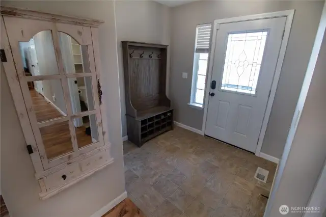 The entry is spacious and flows into the beautiful living room!