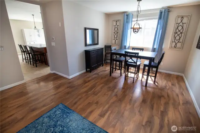 The dining rooms flows right into the kitchen!
