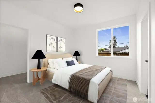 Two of two guest bedrooms that are both located on opposite side of the home allowing the Primary suite to have optimal separation.