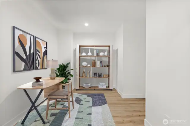 Inside the bonus room shown as an office space. So many options in this versatile space.