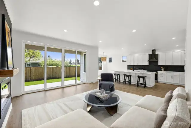 The massive great room is a warm and welcoming space keeping you connected to the stunning kitchen as well as the outdoors.