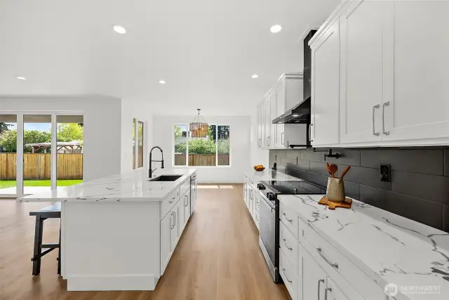 Not a detail missed in this luxury kitchen. Entertain guests and stay connected as you prepare meals.