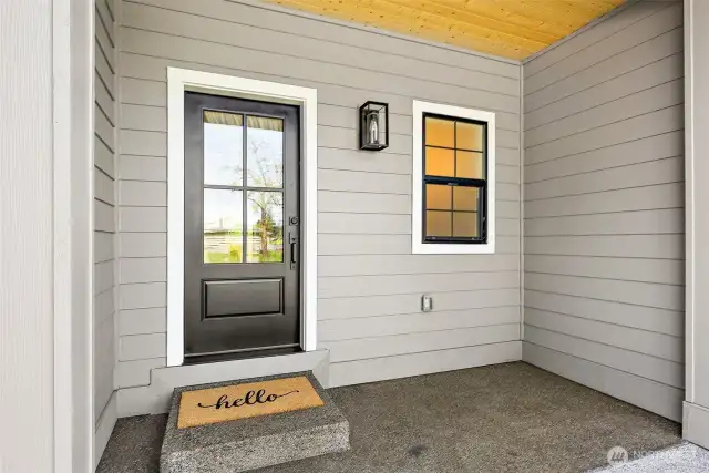 Gorgeous entry door welcomes you in the covered entry.