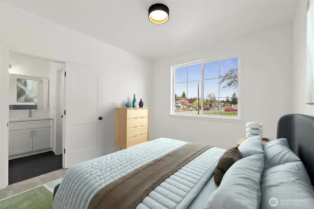 One of two spacious guest bedrooms connect to the unique Jack-n-Jill bathroom.