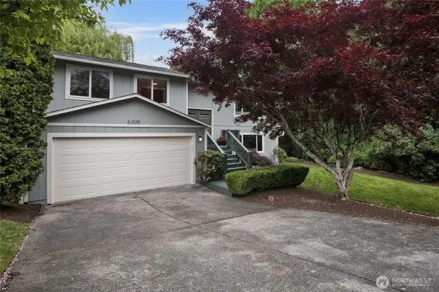Discover your own private oasis at the end of a cul-de-sac in the heart of Newport Hills. This beautifully updated split-entry home sits on an expansive, wooded lot of over an acre, with the tranquil Coal Creek flowing through the backyard—offering both privacy and natural beauty. Must See!