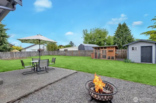 Large backyard with a great patio off the dining and kitchen. Large chicken coop for your new egg laying flock!