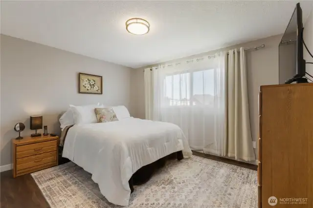 At the other end of the home you'll find a peaceful primary bedroom.