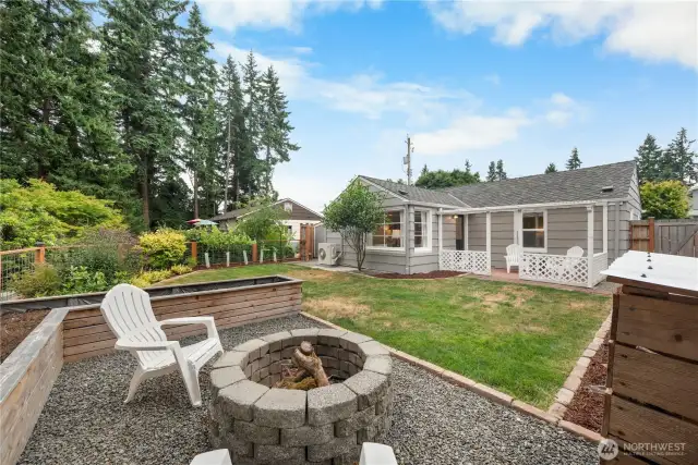 View of back of home from the firepit area.