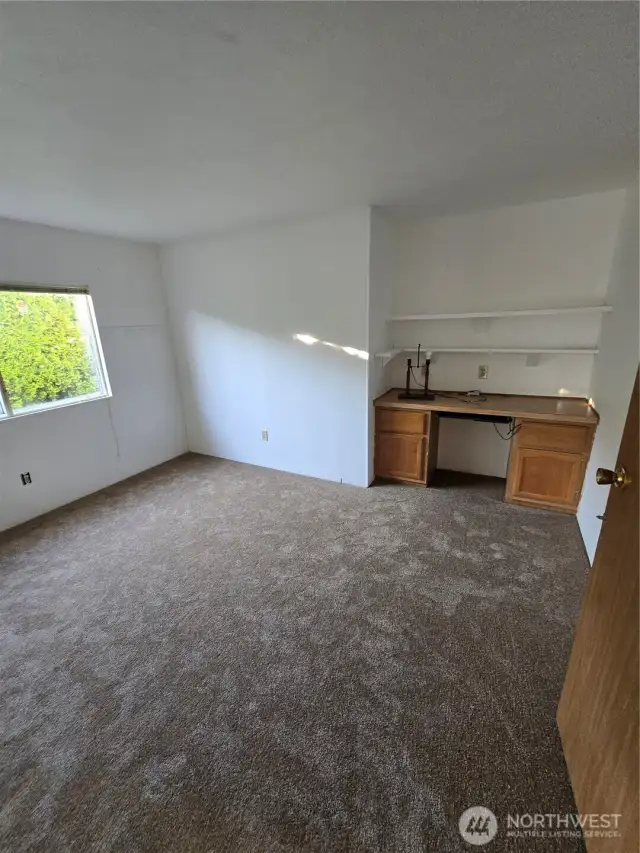 Office off Dining Room with built in desk