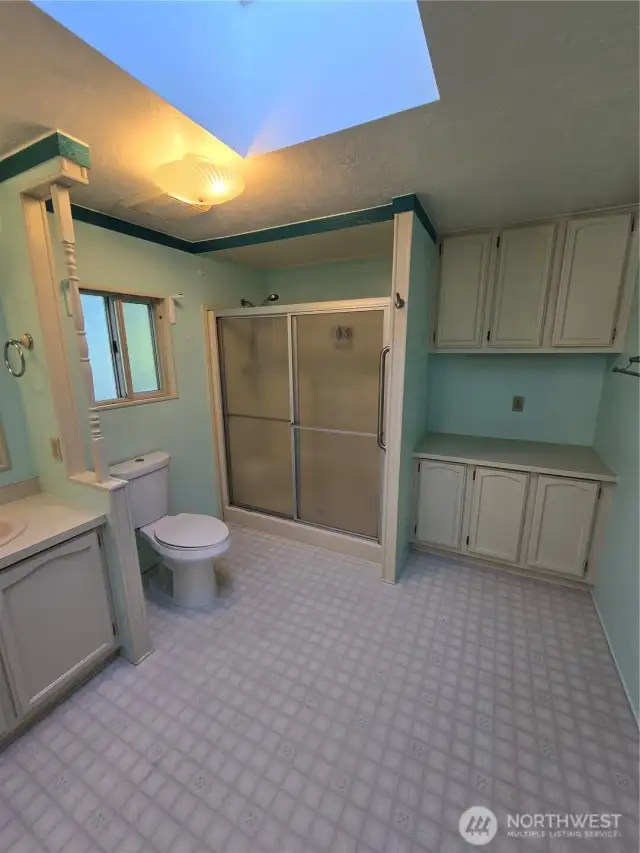 Attached Primary bathroom with separate vanity space