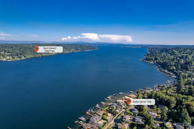 The Burke-Gilman Trail at the end of the block winds through the lakeside neighborhood of Sheridan Beach, followed by the Lake Forest Park Civic Club—both featuring private beaches and amenities for club members. Continue your adventure along the scenic, trail-side boardwalk to Log Boom Park, a public waterfront destination with a sandy beach, public dock, playground, picnic shelter, and boat rentals.