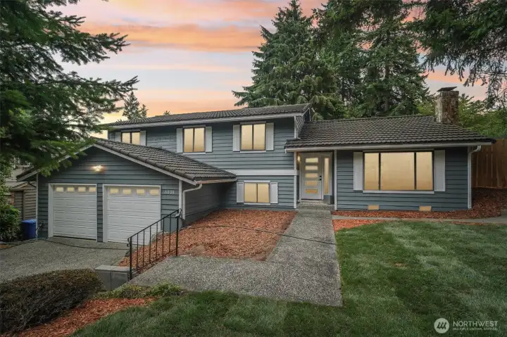 Front house with fresh landscaping.