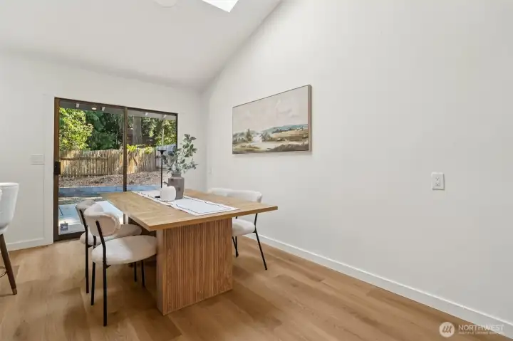 Dinnibg room with skylights