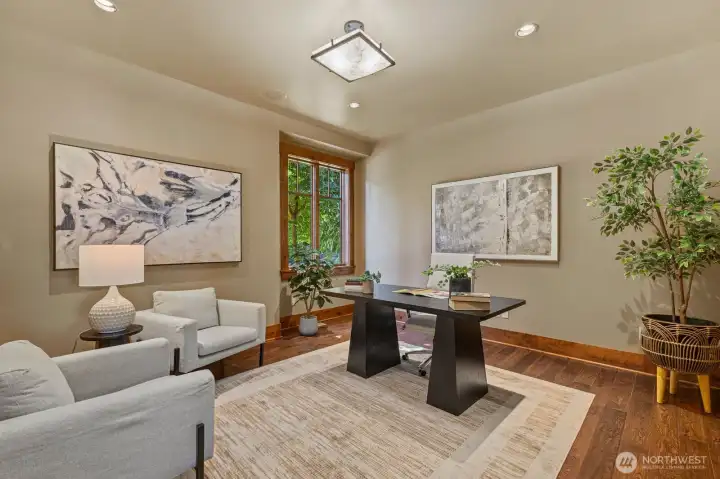 Spacious main-level executive office bathed in light, wired for high-speed internet, and ideal for inspired productivity.