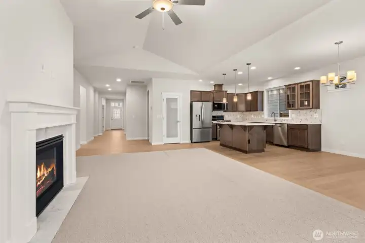 Spacious open concept living area that integrates kitchen & dining for living and entertaining.