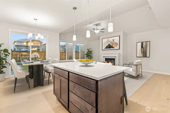 Virtually staged to show flow between kitchen and living room.